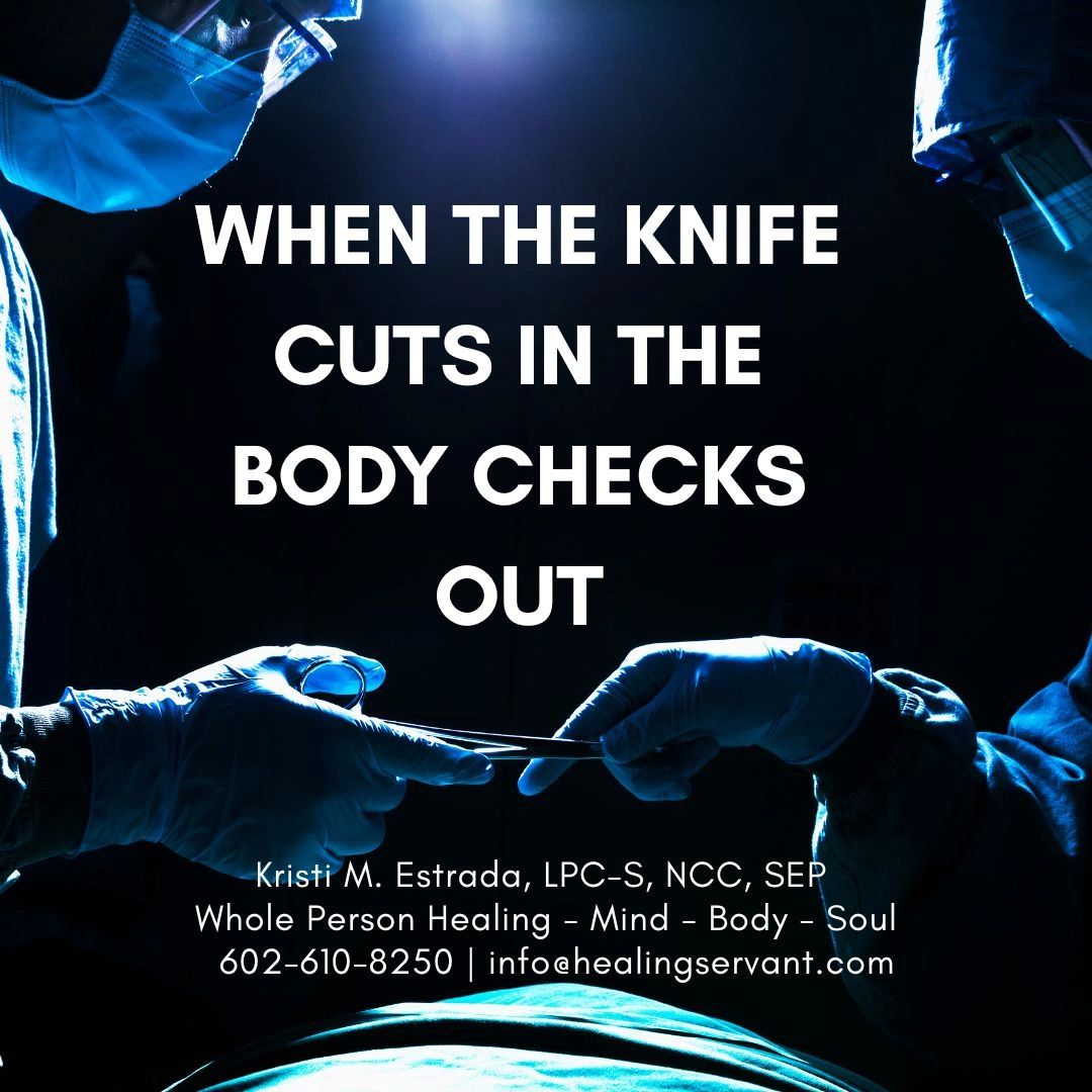 Surgeons operating with dramatic lighting.