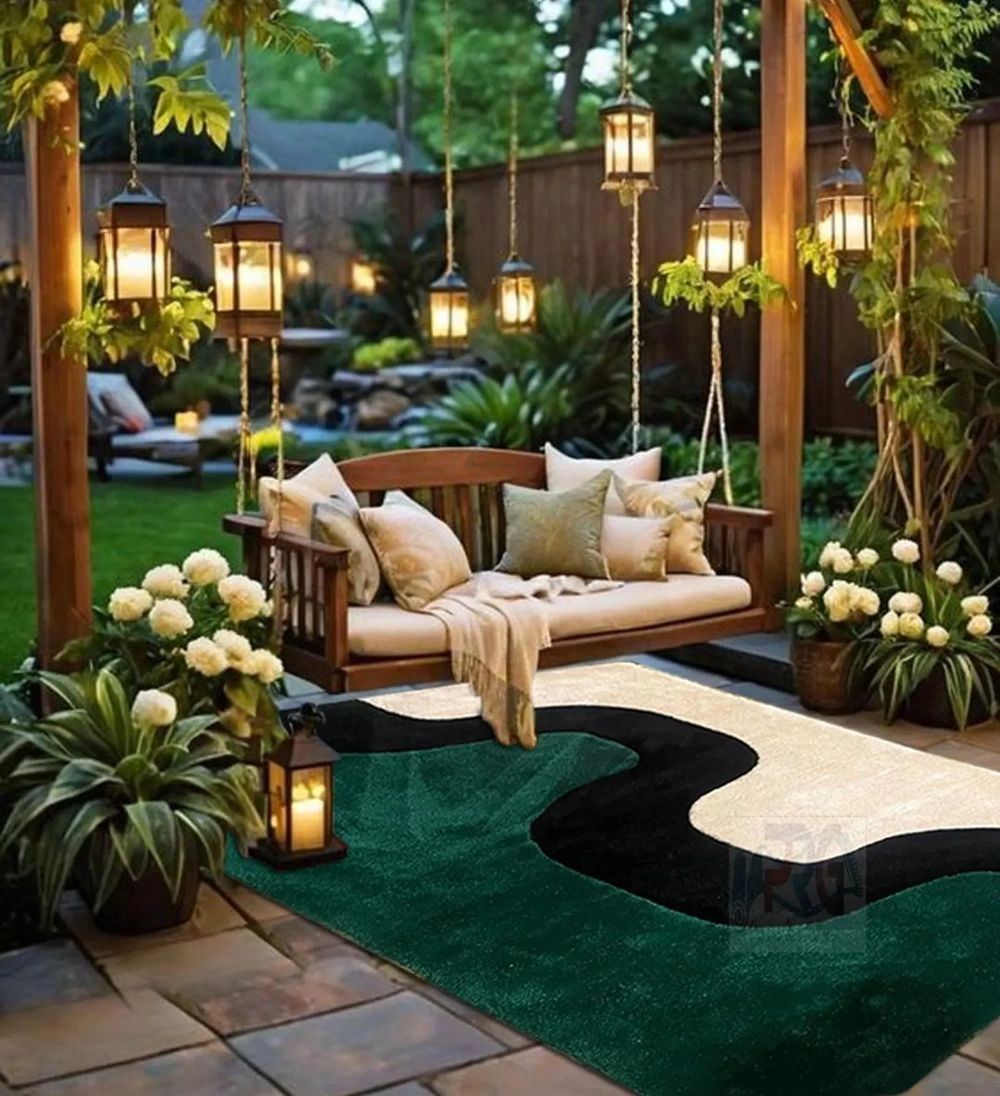 Cozy patio with swing and lanterns.