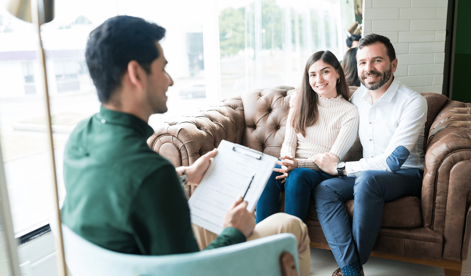 Couple in counseling session with therapist